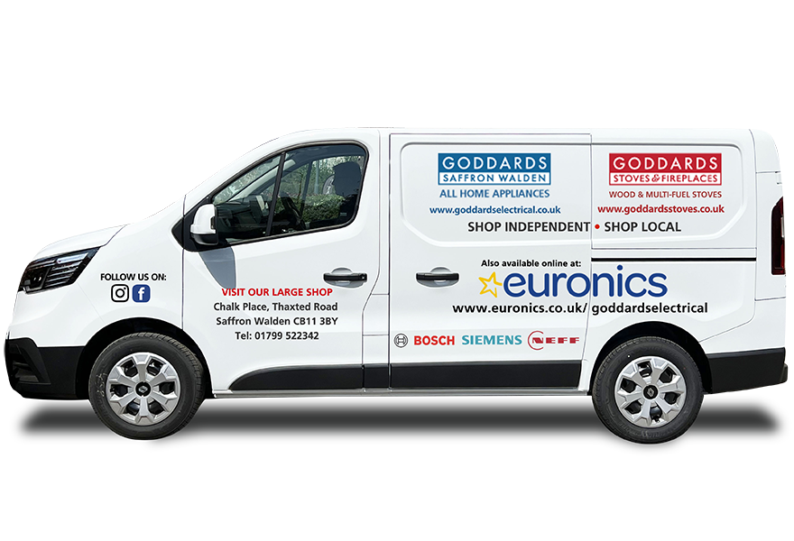 Experienced team unload a new electrical appliance from delivery van